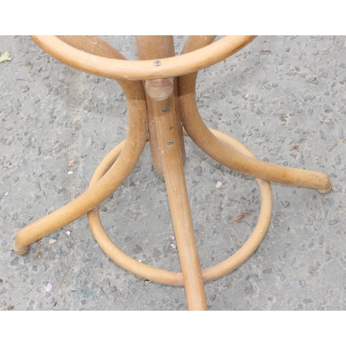 31 - A vintage bentwood coat stand, approx 44cm diameter x 185cm tall