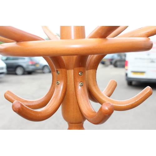 32 - A vintage bentwood coat stand, approx 51cm diameter x 185cm tall