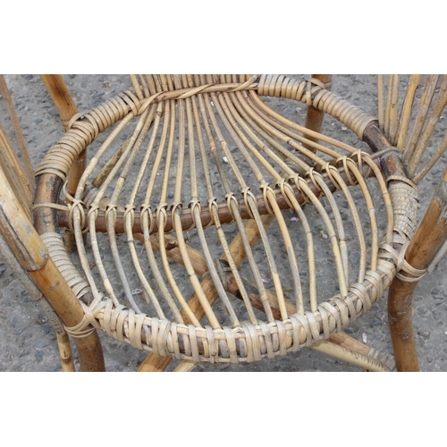 33 - A vintage mid-century bamboo & wicker cane tub armchair in the manner of Franco Albini, approx 86cm ... 