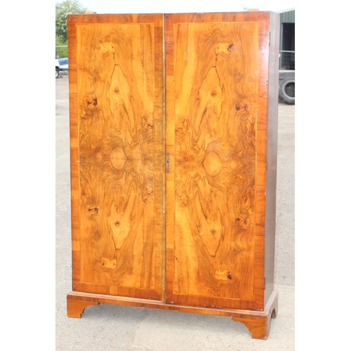 42 - An early 20th century burr walnut wardrobe, approx 121cm wide x 43cm deep x 189cm tall