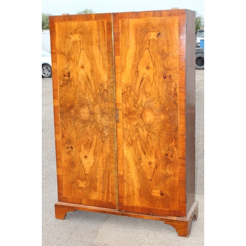 42 - An early 20th century burr walnut wardrobe, approx 121cm wide x 43cm deep x 189cm tall