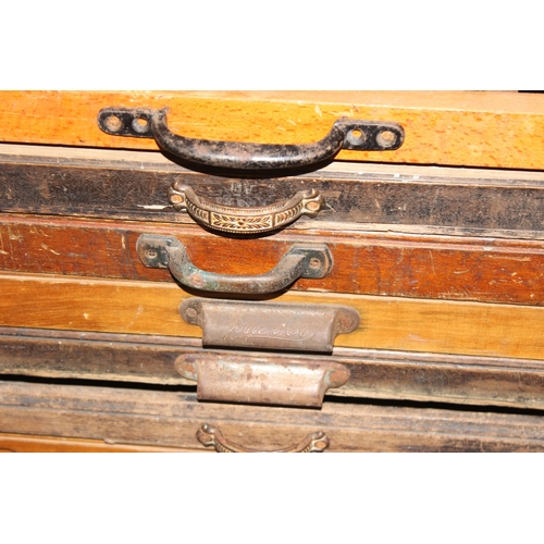 43 - A vintage Caslon Machinery printer's chest of drawers with a harlequin mix of drawers and handles, a... 