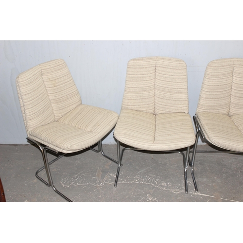 45 - A set of 6 retro Pieff Eleganza range dining chairs with chrome base and fabric covered seats, appro... 