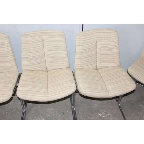 45 - A set of 6 retro Pieff Eleganza range dining chairs with chrome base and fabric covered seats, appro... 