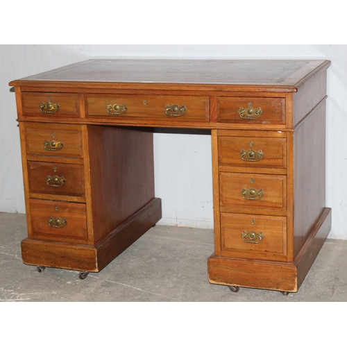 47 - An early 20th century pedestal desk with leather inset top, approx 105cm wide x 66cm deep x 75cm tal... 