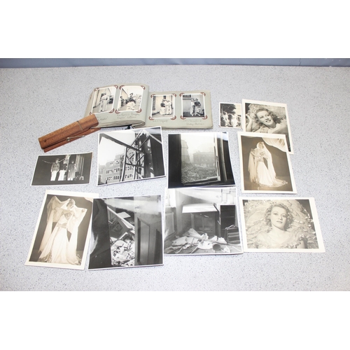 500 - A vintage photograph album depicting scenes of actors and some photographs of Blitz bomb damage duri... 