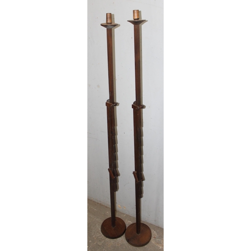 76 - An unusual pair of adjustable wooden floor standing candlesticks, approx 125cm tall (170cm fully ext... 