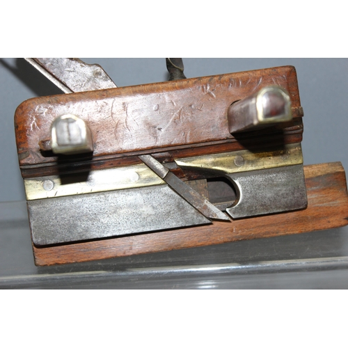 808 - 3 vintage woodworking items to inc a wooden plough plane, a moulding plane with brass base and a woo... 