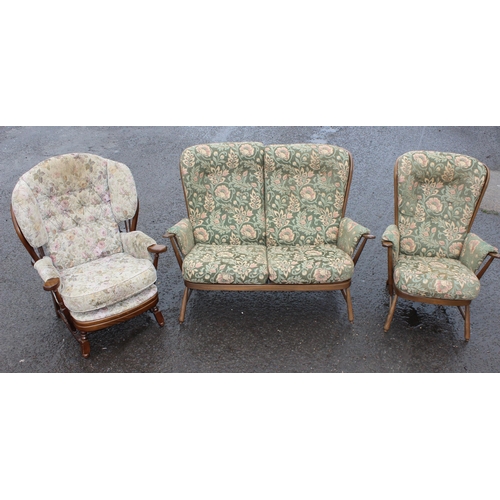 83 - Ercol floral patterned 2 seater sofa and 2 similar chairs, sofa approx 140cm wide x 85cm deep x 103c... 