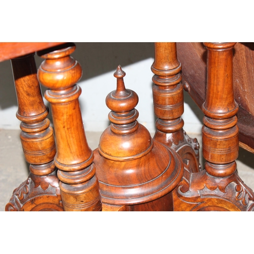 9 - A 19th century tilt-topped walnut oval table with Tunbridgeware inlay and carved pedestal base, appr... 