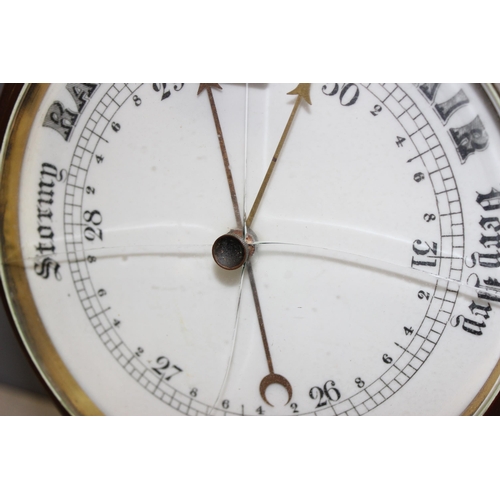 1305 - An antique oak cased aneroid wall barometer, approx 85cm tall