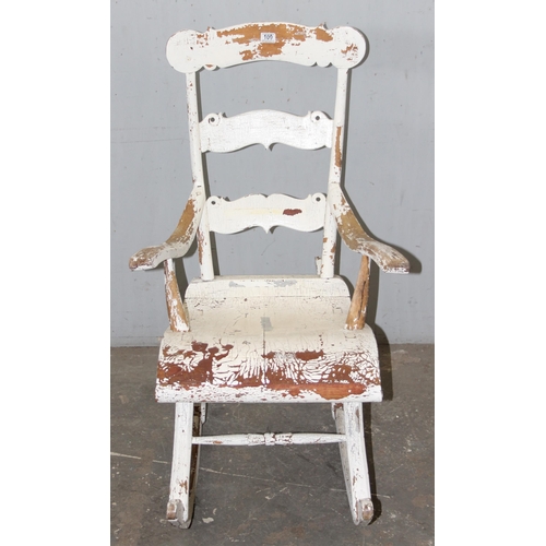 100 - A vintage Scandinavian rocking chair with distressed white painted finish, carved with E Nyblom 1928... 