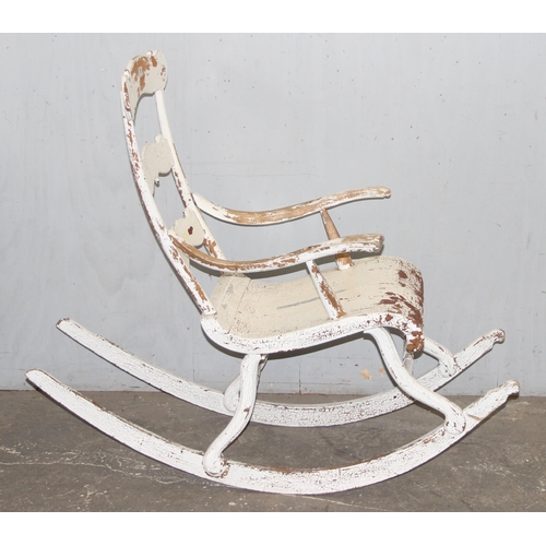 100 - A vintage Scandinavian rocking chair with distressed white painted finish, carved with E Nyblom 1928... 