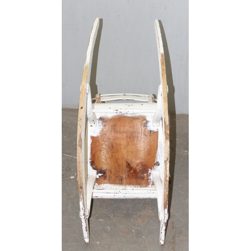 100 - A vintage Scandinavian rocking chair with distressed white painted finish, carved with E Nyblom 1928... 