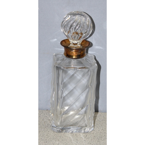 1008 - Vintage glass decanter with gilt-silver collar, approx 24cm H