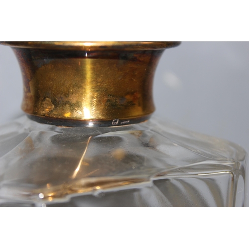 1008 - Vintage glass decanter with gilt-silver collar, approx 24cm H