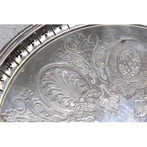 1014 - Large Georgian style silver plated tray on feet, a Victorian silver plated tray with aesthetic desig... 