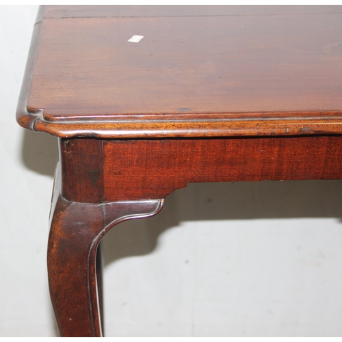 103 - An antique mahogany side table with cabriole legs, possibly Dutch, approx 70cm wide x 43cm deep x 73... 