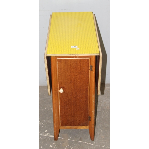 109 - A vintage yellow Formica topped drop leaf dining table, approx 91cm wide x 61cm deep x 76m tall