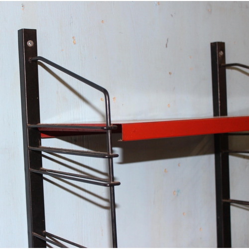 113 - Retro red wall shelf with black supports, Tomado style, approx 41cm wide