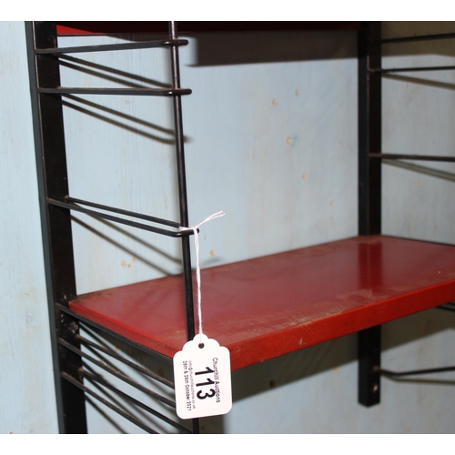 113 - Retro red wall shelf with black supports, Tomado style, approx 41cm wide