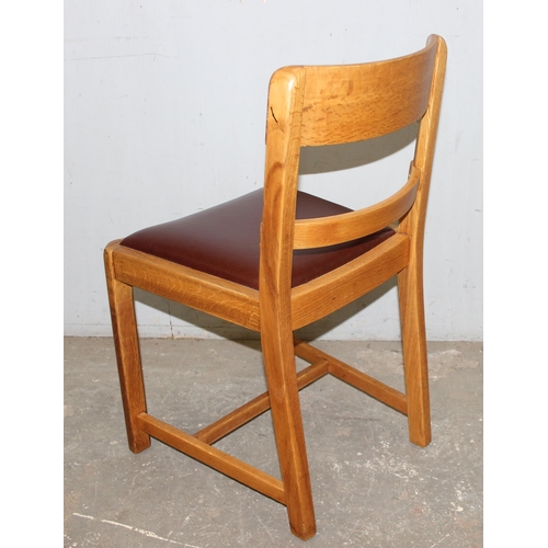 115 - Pair of mid 20th century Gordon Russell design light oak chairs with peg detail, likely retailed by ... 