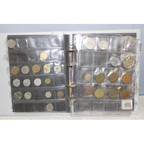 1207 - Qty of assorted world coins in album and a vintage sealed money box and contents, seeming to contain... 