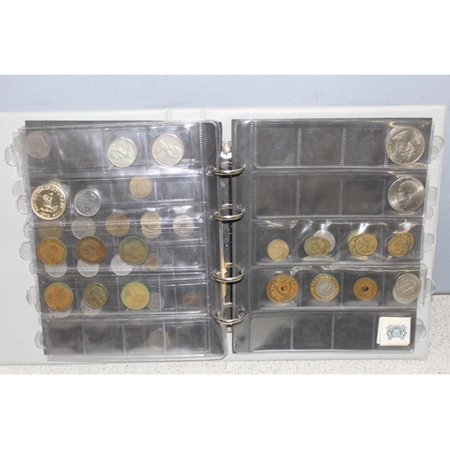 1207 - Qty of assorted world coins in album and a vintage sealed money box and contents, seeming to contain... 