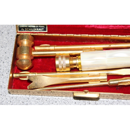 An interesting brass miniature tool kit with five interchangeable tool ...