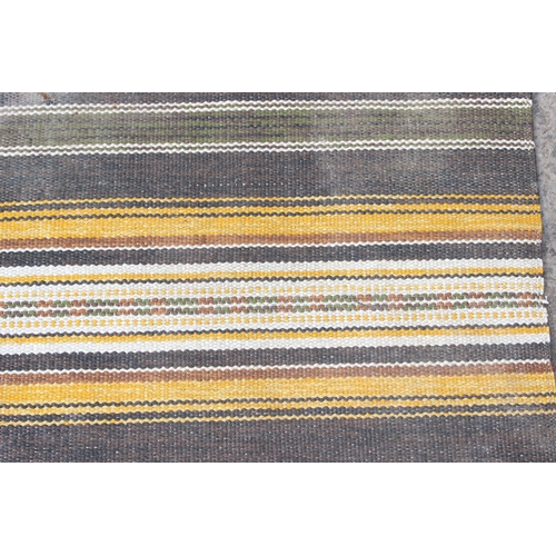 210 - 7 assorted Swedish rugs, largest approx 315cm x 65cm