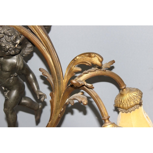 243 - Antique French 3-branch Belle Epoque patinated table lamp with cast bronzed metal cherub and gilt de... 