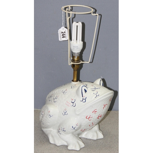 244 - An interesting Italian made white glazed ceramic lamp base in the form of a frog with blue and red d... 