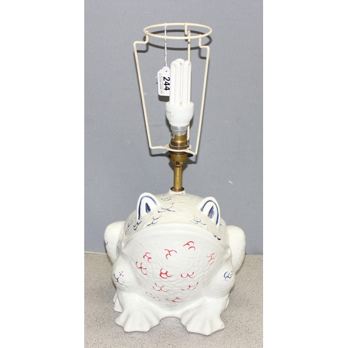 244 - An interesting Italian made white glazed ceramic lamp base in the form of a frog with blue and red d... 