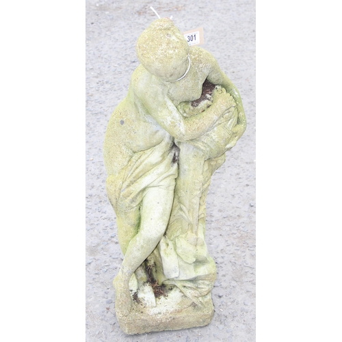 301 - A weathered concrete garden lady statue, approx 79cm tall