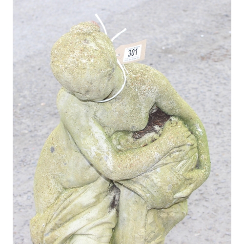 301 - A weathered concrete garden lady statue, approx 79cm tall