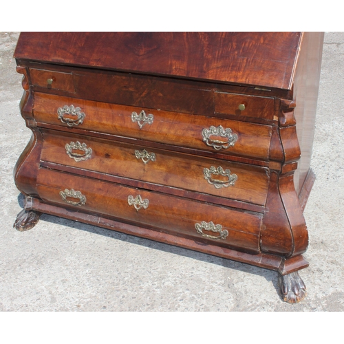 87 - Early 20th century Dutch figured walnut bombe bureau, fall-front enclosing fitted interior with cent... 