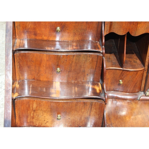 87 - Early 20th century Dutch figured walnut bombe bureau, fall-front enclosing fitted interior with cent... 