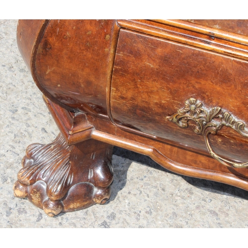 88 - A 19th century Dutch walnut bombe shaped chest, quarter-veneered serpentine top above 3 long convex,... 