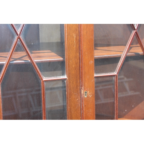 90 - 2 antique style mahogany cabinets, a glazed display cabinet and a fall front bureau or writing desk,... 