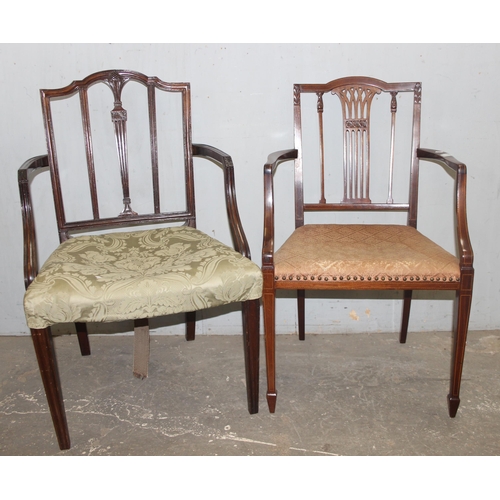 91 - 2 antique carver armchairs with stuffed upholstered seats and carved backs