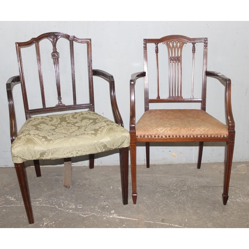 91 - 2 antique carver armchairs with stuffed upholstered seats and carved backs