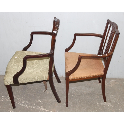 91 - 2 antique carver armchairs with stuffed upholstered seats and carved backs