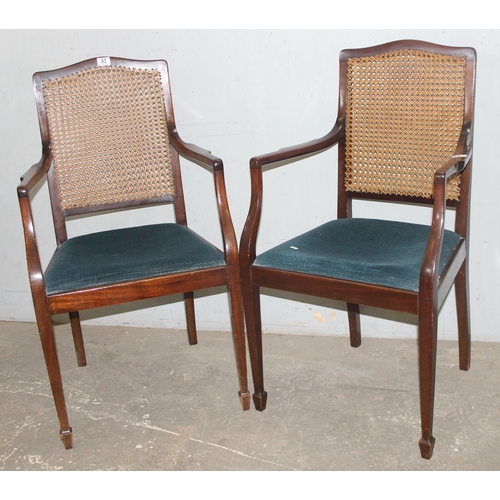 93 - A pair of blue seated armchairs with bergere backs, early 20th century