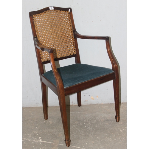 93 - A pair of blue seated armchairs with bergere backs, early 20th century