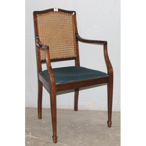 93 - A pair of blue seated armchairs with bergere backs, early 20th century