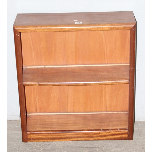 94 - A small retro wooden bookcase, approx 67cm wide x 25cm deep x 73cm tall