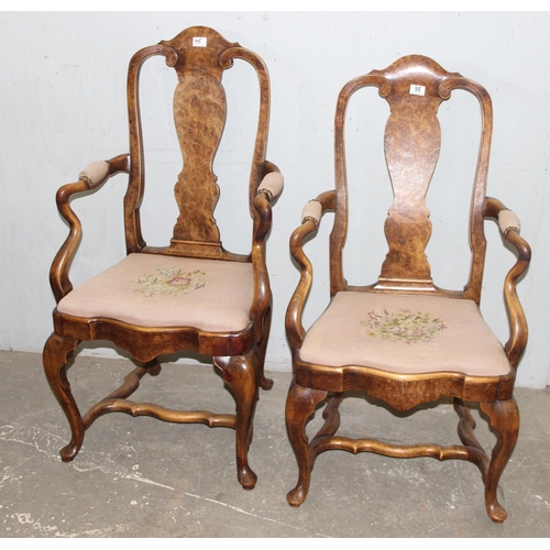 95 - A near pair of Queen Anne style walnut open armchairs with tapestry seats, likely early 20th century