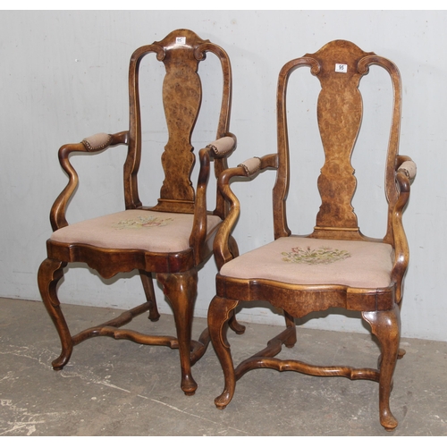 95 - A near pair of Queen Anne style walnut open armchairs with tapestry seats, likely early 20th century