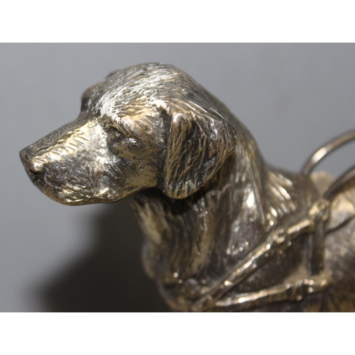 1013 - A vintage silver plated model of a Labrador guide dog on black stone base, by Loius Lejeune of Ely, ... 