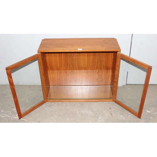 117 - 1960’s Danish style solid teak 2-door wall mounted /table top display cabinet with 2 adjustable and ... 